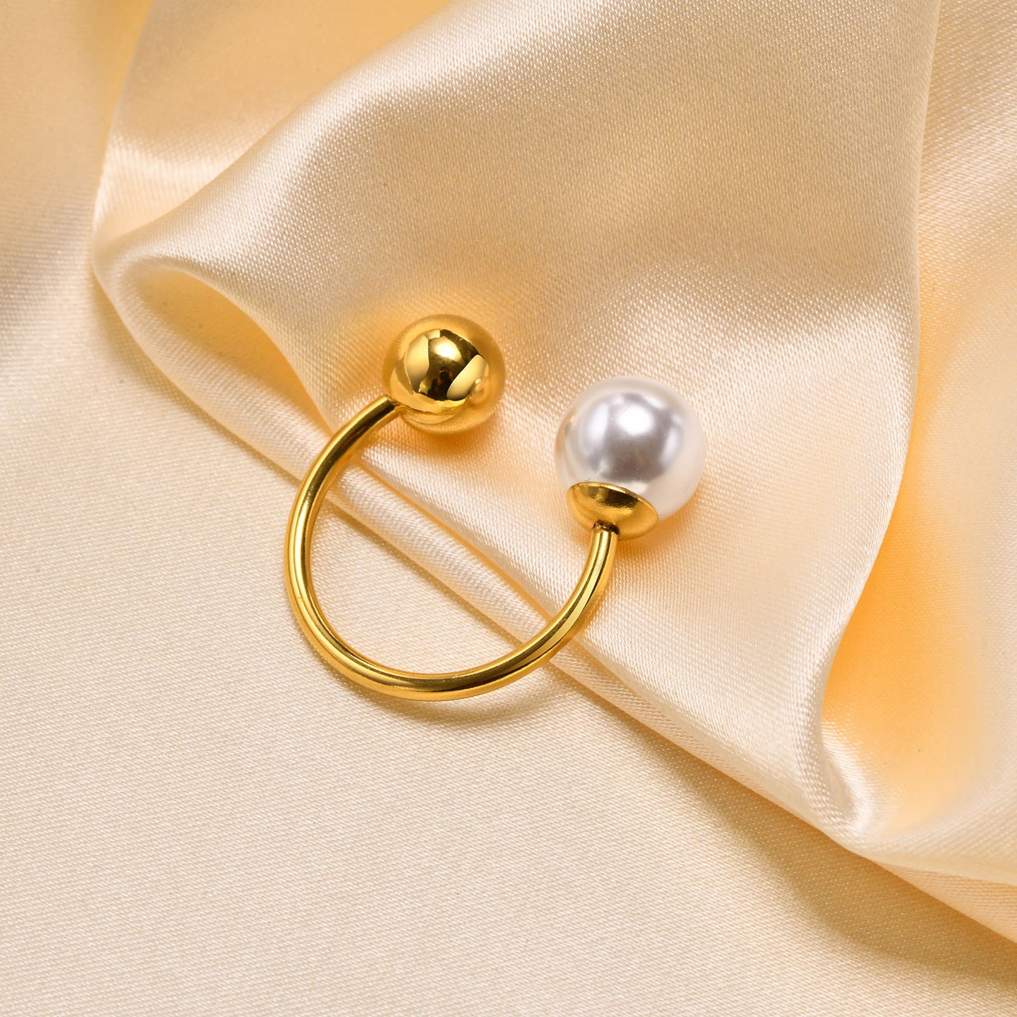 Dual sphere adjustable open ring