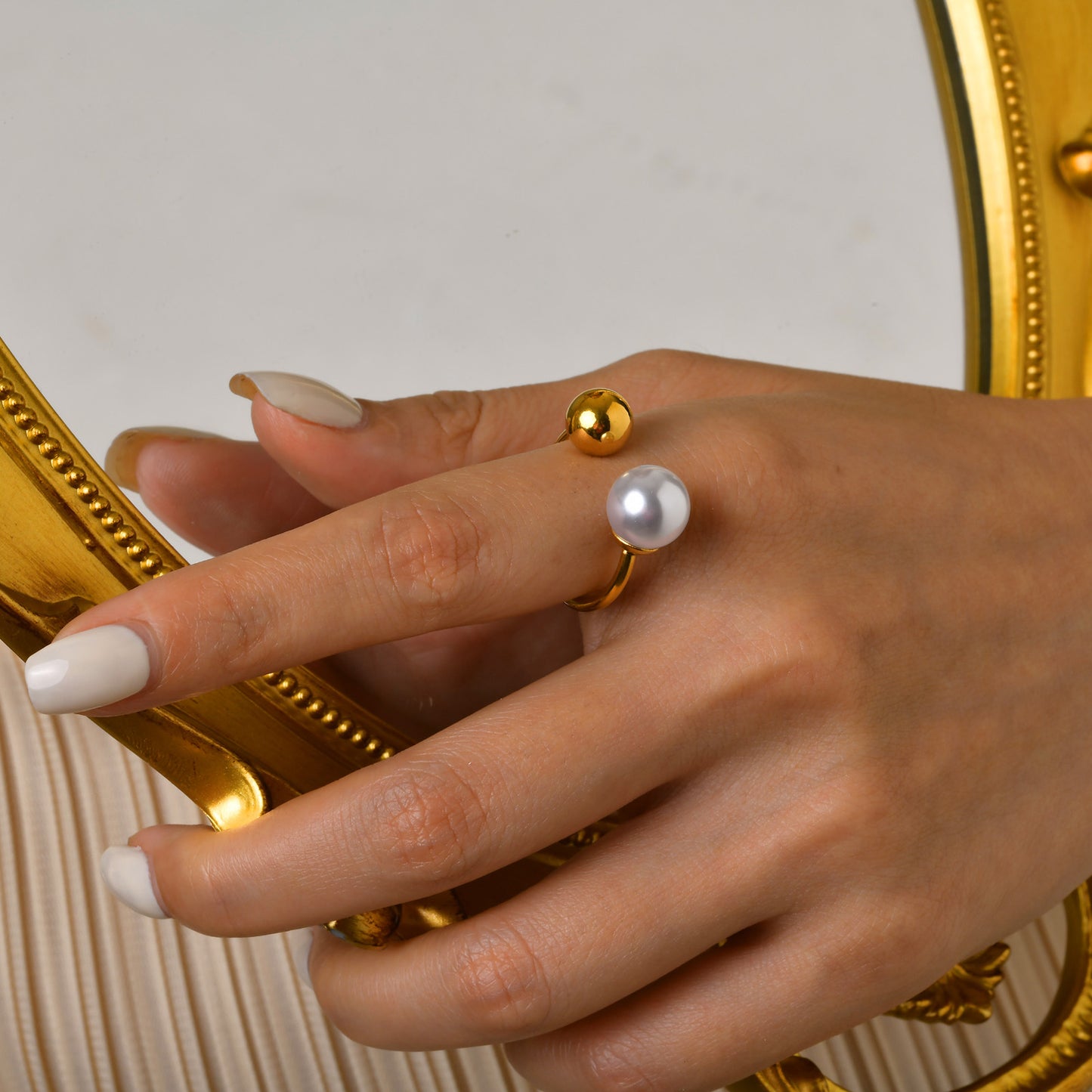 Dual sphere adjustable open ring