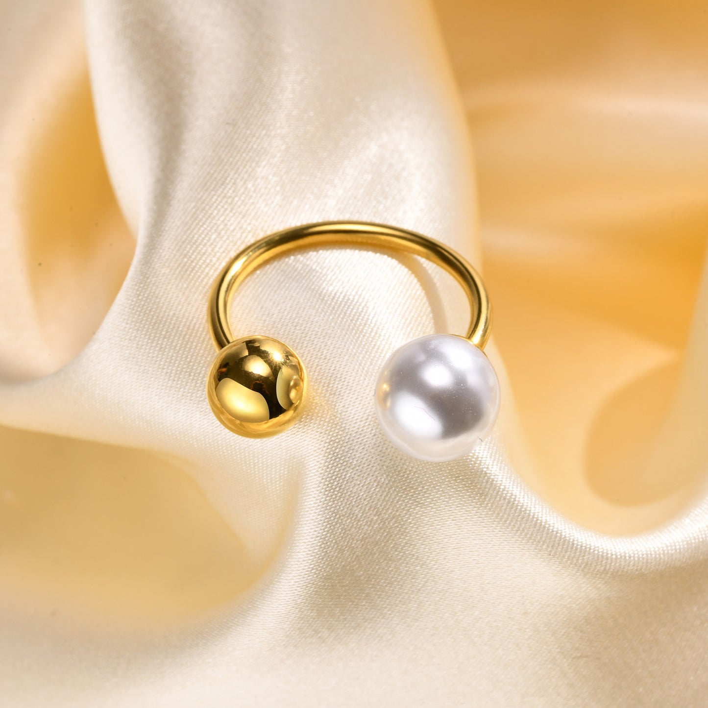 Dual sphere adjustable open ring