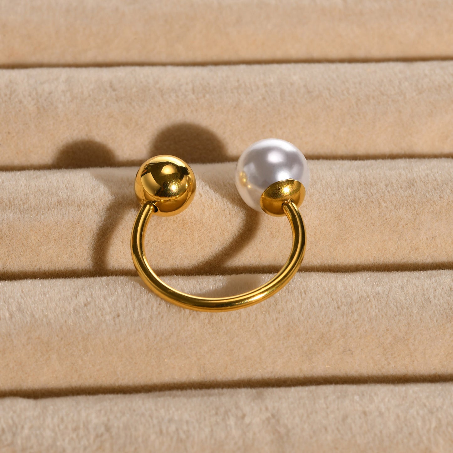 Dual sphere adjustable open ring