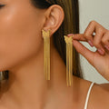 Golden Wings Tassel Earrings