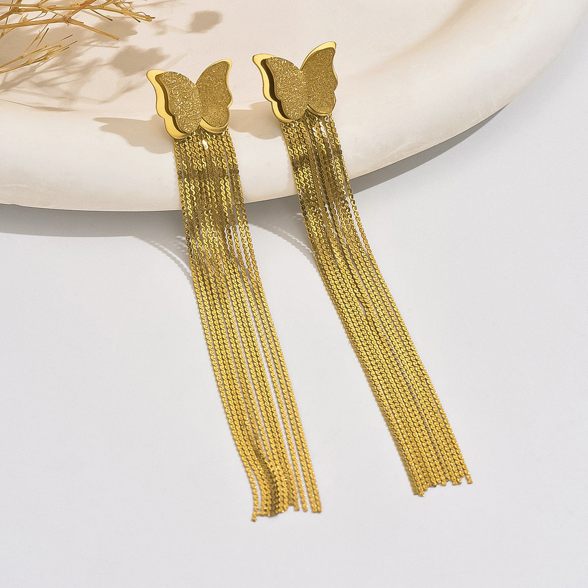 Golden Wings Tassel Earrings