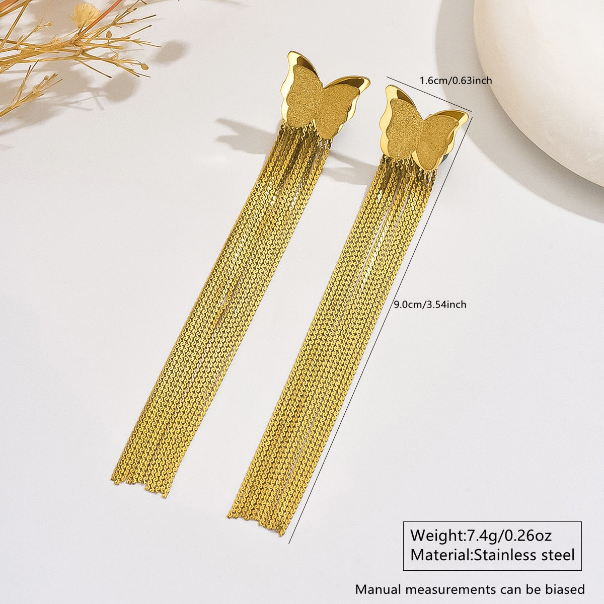Golden Wings Tassel Earrings