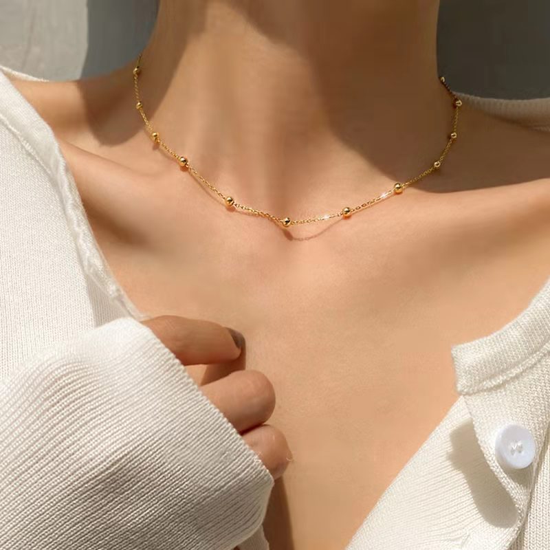 Golden Bead Charm Necklace