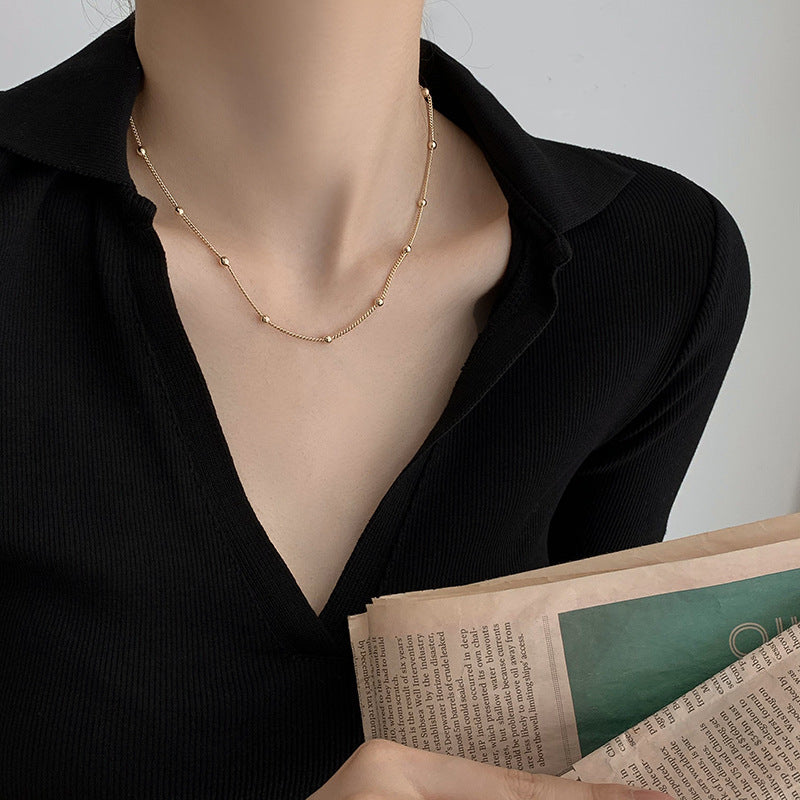 Golden Bead Charm Necklace