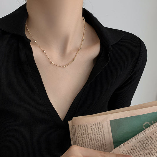 Golden Bead Charm Necklace