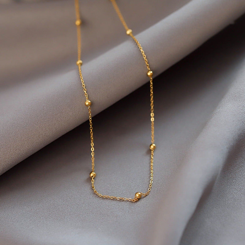 Golden Bead Charm Necklace